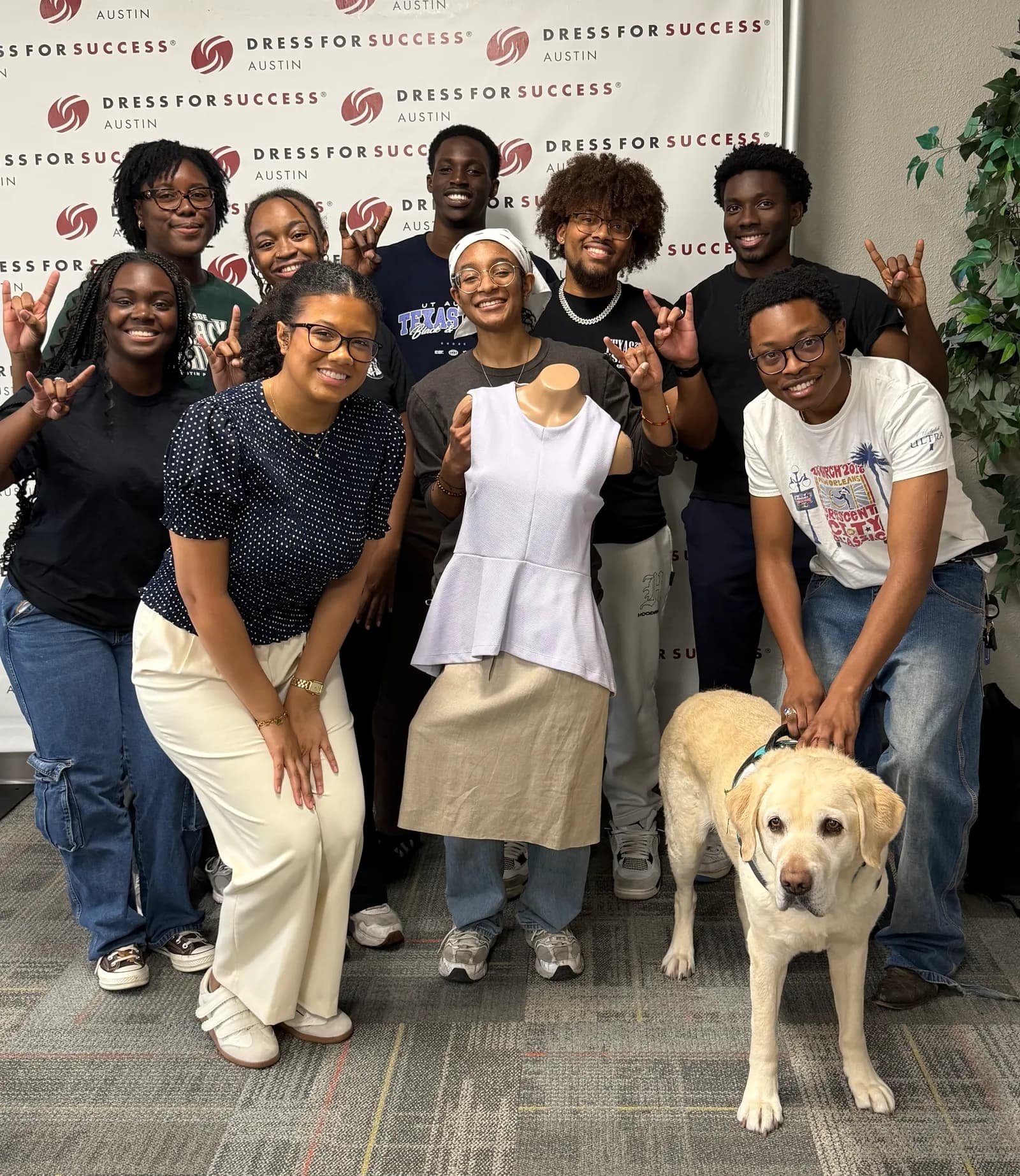 NSBE volunteers gathered for a group photo at Dress for Success Austin